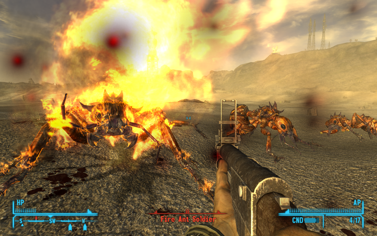 Fallout: New Vegas (Windows) screenshot: Man, you are on fire today! A heated battle against gigantic ants