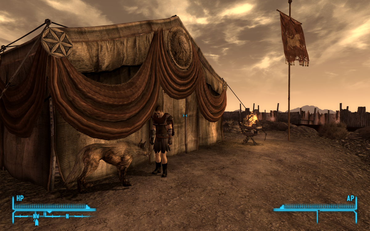 Fallout: New Vegas (Windows) screenshot: A punk and his dog in the Legion camp. Those guys idolize early Imperial Roman culture and are quite crazy