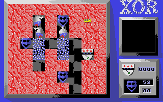 Xor (Atari ST) screenshot: Will have to drop the boulder to release the balloon here