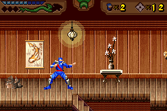 The Revenge of Shinobi (Game Boy Advance) screenshot: Inside a peasant's hut.