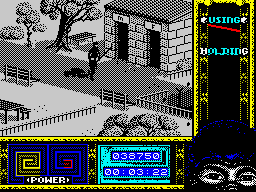 Ninja Remix (ZX Spectrum) screenshot: Level 1, "The Park": <i>Nunchaku</i>.<br> The mighty ninja searches for the second piece of the <i>Nunchaku</i>, the ancient weapon which hurt many people on their susceptibilities.