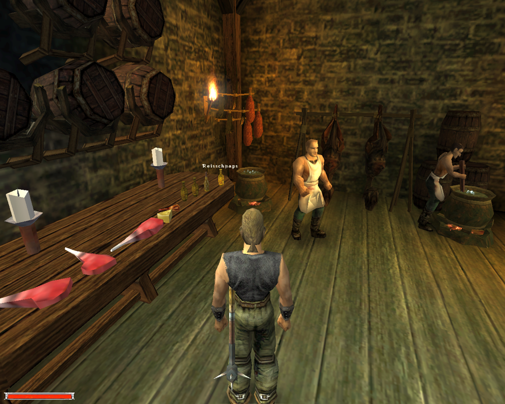 Gothic (Windows) screenshot: Example of indoor detail. Plenty of food in this kitchen; also, see how people do different things, working, walking around, and so on