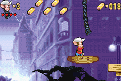 An American Tail: Fievel's Gold Rush (Game Boy Advance) screenshot: Using a lift to reach more gold bars.