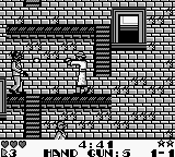 Dick Tracy (Game Boy) screenshot: Dick Tracy makes his way down to ground level, but Big Boy's men stand in his way.