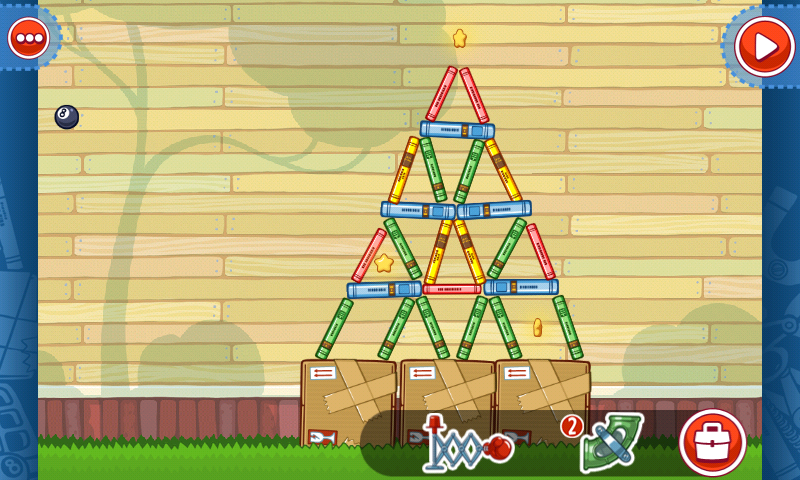 Amazing Alex (Android) screenshot: Knock down the pyramid