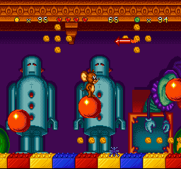 Tom and Jerry (SNES) screenshot: Making his way through some bouncy balls, Jerry must be careful with certain rocket-like dangers...
