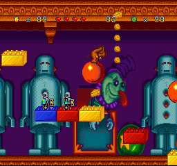 Tom and Jerry (SNES) screenshot: Luckily, Jerry jump-avoids more robots and reaches another bouncy ball: time to more cheese stuff!