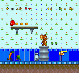 Tom and Jerry (SNES) screenshot: Finally! After having avoid the menaces of a living kitchen, Jerry reaches the "Level Clear" sign...