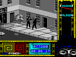 Ninja Remix (ZX Spectrum) screenshot: Level 2, "The Street": A fight near the store.<br> To access this place, you have to knock down the door with a <i>Ninjutsu</i> kick.