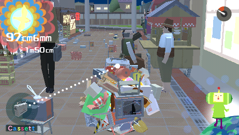 Me & My Katamari (PSP) screenshot: The katamari rolls into the town streets