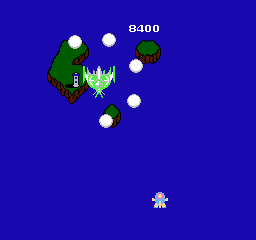 TwinBee (NES) screenshot: The boss is protected by a field of balls