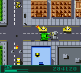 BattleTanx (Game Boy Color) screenshot: Using a Moto tank against the enemy tower.