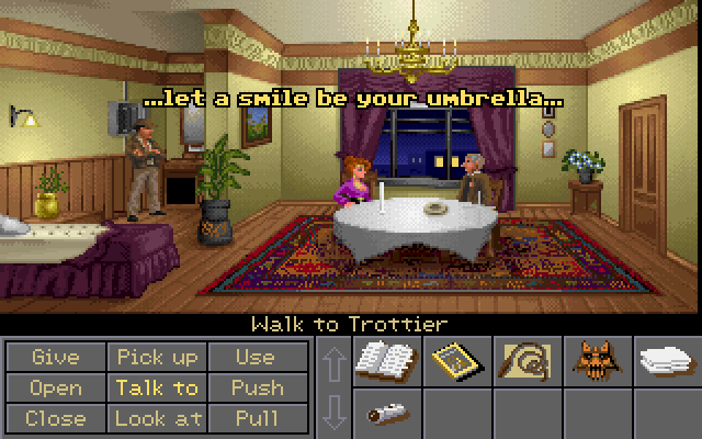 Indiana Jones and the Fate of Atlantis (FM Towns) screenshot: Monte Carlo hotel room (Team path), Sophia's seance with Trottier