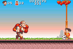 Soccer Kid (Game Boy Advance) screenshot: The first boss is a Rugby player