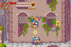 Disney's Magical Quest 3 starring Mickey & Donald (Game Boy Advance) screenshot: Bouncing on an enemy's head.