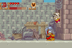 Disney's Magical Quest 3 starring Mickey & Donald (Game Boy Advance) screenshot: After defeating the giant turkey, Donald receives a special armor from the Blacksmith couple.