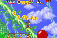 Disney's Magical Quest Starring Mickey & Minnie (Game Boy Advance) screenshot: Lots of coins fall if you pull on certain things in the game