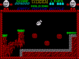 Dizzy: The Ultimate Cartoon Adventure (ZX Spectrum) screenshot: Carefully time your jumps over the moving logs
