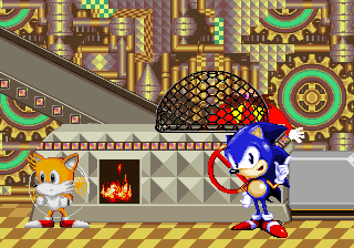 SegaSonic Popcorn Shop (Arcade) screenshot: At the bottom of the chute, the corn is safely caged where Eggman can't get to it.