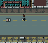 Grand Theft Auto (Game Boy Color) screenshot: A police car pursuing you