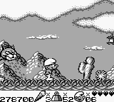 The Smurfs Travel the World (Game Boy) screenshot: Cougar's head behind you. Be careful in North America (male).