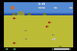 Planet Patrol (Atari 2600) screenshot: Shoot the red ships but avoid the smaller, blue missiles.
