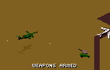 Desert Strike: Return to the Gulf (Lynx) screenshot: Weapons armed. A Howitzer is shooting at me.