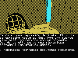 La Aventura Original (MSX) screenshot: A depression 23 feet deep with a locked metal grate.