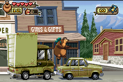 Open Season (Game Boy Advance) screenshot: To go ahead, Boog must to jump-avoid a truck and a car.