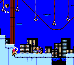 Disney's Darkwing Duck (NES) screenshot: Darkwing Duck shoots enemy.