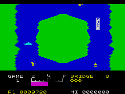 River Raid (ZX Spectrum) screenshot: You can refuel your plane slowly flying over these fuel bars. You can also destroy them by mistake.