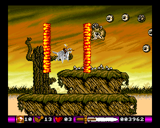 Pegasus (Amiga) screenshot: Using a special weapon against some flying eyeballs.
