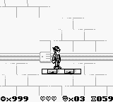 The Blues Brothers: Jukebox Adventure (Game Boy) screenshot: Ride the platform across the gap