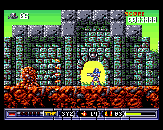 Turrican II: The Final Fight (Amiga) screenshot: Firing at a slimy enemy.
