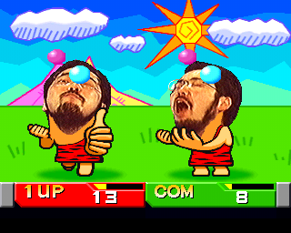 Bishi Bashi Special (PlayStation) screenshot: HBB: eat more colored balls than your fellow caveman to the right to win.