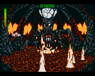 Blastar (Amiga) screenshot: When fighting this boss, the game changes perspective again. Now you look at your ship from behind (ship is seen to the left).