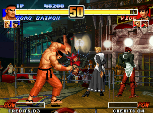 The King of Fighters '96 (Neo Geo) screenshot: Goro Daimon smashes Vice successfully with the accuracy of his grabbing move Tsukami Tataki Tsuke...
