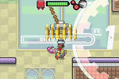 Drill Dozer (Game Boy Advance) screenshot: You'll need to grab onto this swinging chandelier