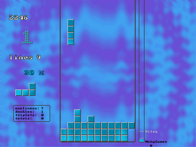 Tomtris (DOS) screenshot: Level one; note the graphical ranking meter on the right
