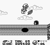The Smurfs (Game Boy) screenshot: This log turns every two seconds and if your on it when it does you fall to your death