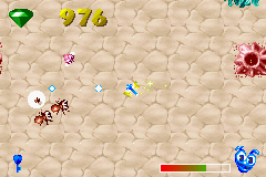 Spyro: Season of Ice (Game Boy Advance) screenshot: Sparx fighting enemies in the Ant Farm
