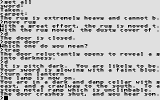 Zork (Atari ST) screenshot: Finally achieving entrance to the Great Underground Empire, with sword and lantern!