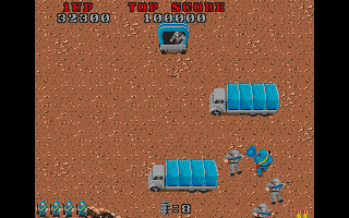 Commando (Atari ST) screenshot: Blue trucks bring more enemy soldiers.