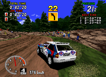 SEGA Rally Championship (SEGA Saturn) screenshot: The grass doesn't slow you down if you drive straight through it, but will make you spin out if you try drifting.