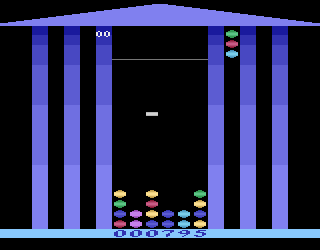 Strat O Gems Deluxe (Atari 2600) screenshot: This will clear what ever color gem you place it on, anywhere on the board plus advance you to the next level.