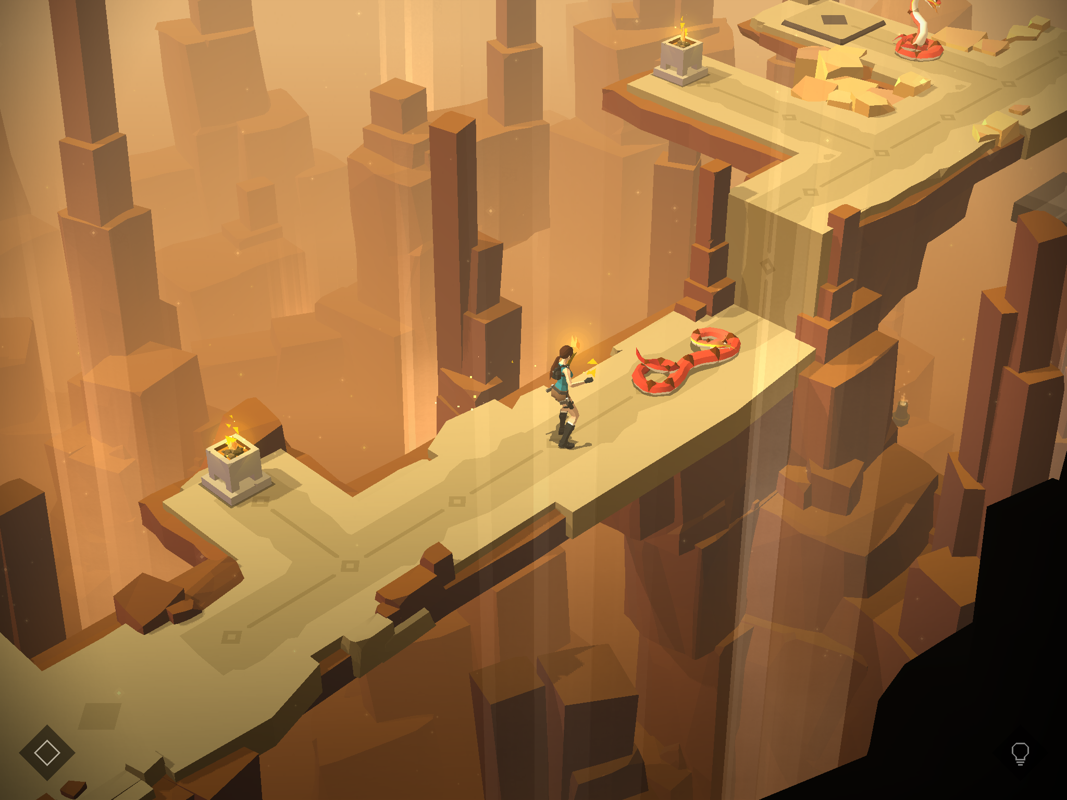 Lara Croft GO (iPad) screenshot: Using a torch to make the snake retreat