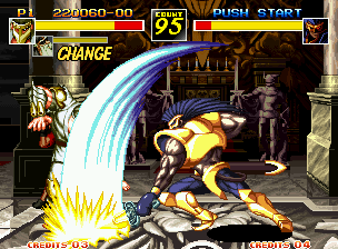 Kizuna Encounter: Super Tag Battle (Neo Geo) screenshot: Mezu attempts to strikes back King Leo, but he's stopped by his sword-based attack Earth Chopper...