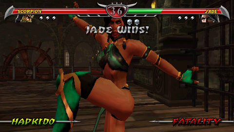 Mortal Kombat: Unchained (PSP) screenshot: Jade, having poked Scorpion.