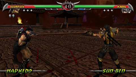 Mortal Kombat: Unchained (PSP) screenshot: Scorpion pulling Kabal