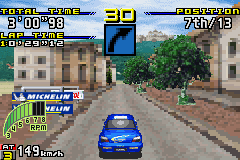 SEGA Rally Championship (Game Boy Advance) screenshot: Impreza on Village track in a place where the road gets narrow